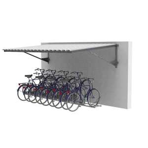 FalcoLempo Luifel bevestigd aan een bakstenen muur, ideaal voor flexibele en duurzame overkapping van fietsen en opslag.